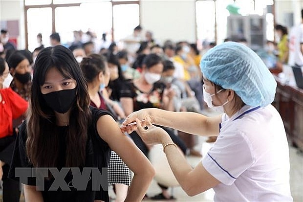 Đề xuất chính sách sống chung với COVID-19 an toàn, hiệu quả nhất | Xã hội | Vietnam+ (VietnamPlus)