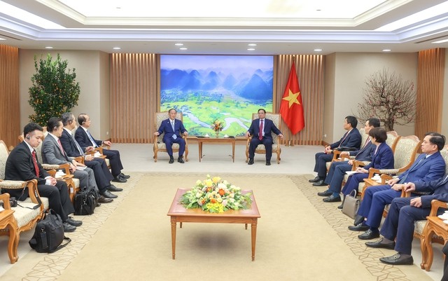 Thủ tướng Phạm Minh Chính tiếp nguyên Thủ tướng Nhật Bản Suga Yoshihide