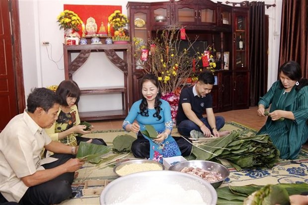 Xuân Quý Mão 2023: Phong tục Tết của những gia đình Lào-Việt | Người Việt bốn phương | Vietnam+ (VietnamPlus)