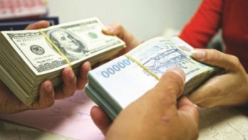 Tỷ giá vọt tăng, giá vàng đi xuống sau biên bản cuộc họp của Fed