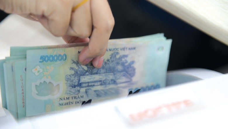 NHNN giao toàn bộ chỉ tiêu tăng trưởng tín dụng 15% năm 2024 cho các ngân hàng.