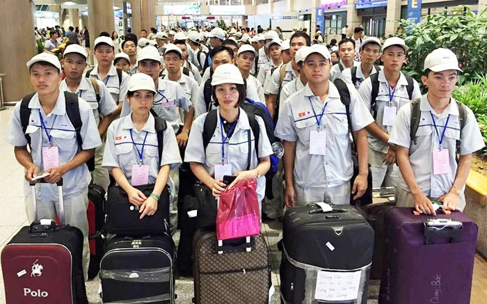 lao động Việt Nam đi làm việc ở nước ngoài. (Ảnh minh họa)