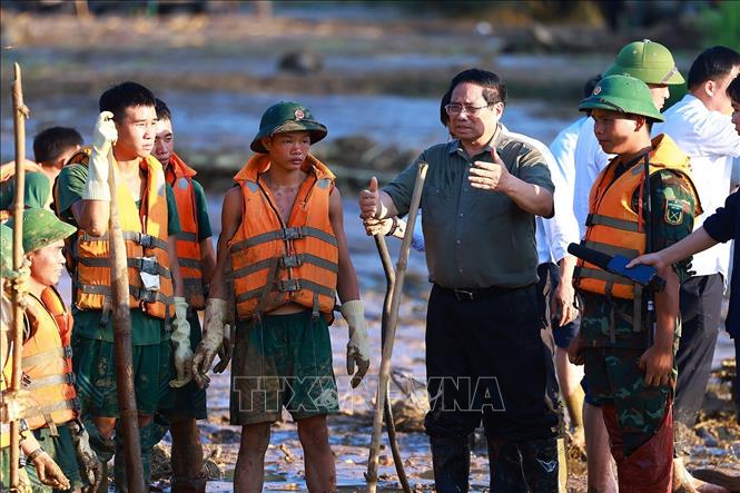 Thủ tướng Phạm Minh Chính: Đặt sức khỏe, tính mạng của người dân lên trên hết, trước hết Chú thích ảnh