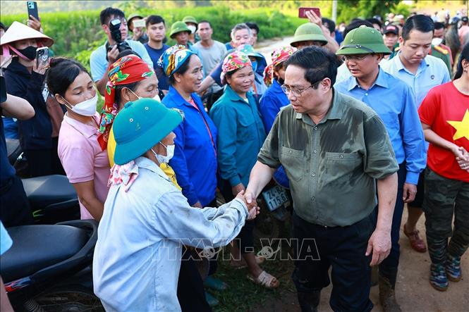 Thủ tướng Phạm Minh Chính: Đặt sức khỏe, tính mạng của người dân lên trên hết, trước hết Chú thích ảnh