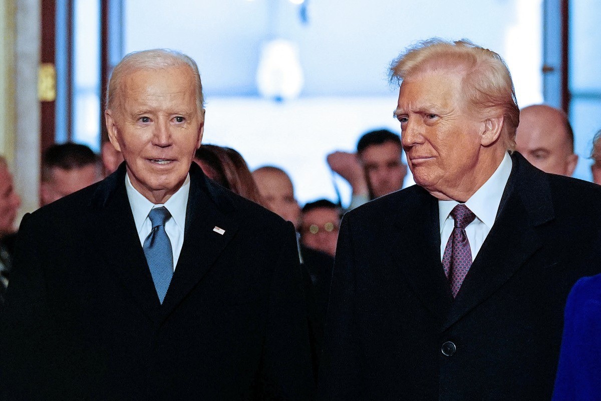 Cựu tổng thống Mỹ Joe Biden và Tổng thống Mỹ Donald Trump trong ngày ông Trump nhậm chức 20/1/2025. (Ảnh: AFP)