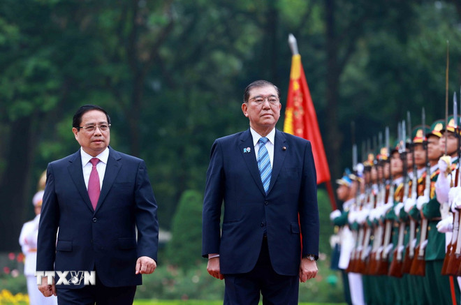 ttxvn-thu-tuong-le-don-thu-tuong-nhat-ban-2.jpg