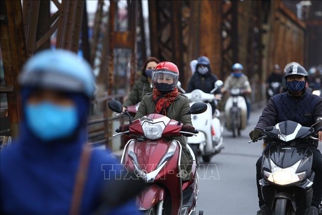 Hà Nội rét về sáng sớm và đêm. (Ảnh minh họa: TTXVN)