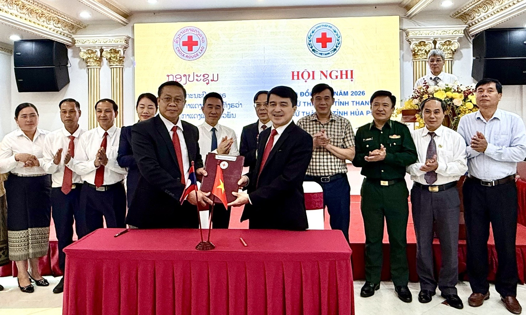 Hội Chữ thập đỏ hai tỉnh Thanh Hóa (Việt Nam) và Hủa Phăn (Lào) ký kết biên bản ghi nhớ hợp tác giai đoạn 2026-2027. (Ảnh: Hội Chữ thập đỏ Việt Nam)