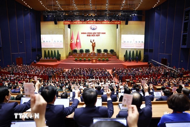 Đại biểu biểu quyết thông qua Nghị quyết Đại hội XIV của Đảng. (Ảnh TTXVN) Đại biểu biểu quyết thông qua Nghị quyết Đại hội XIV của Đảng. (Ảnh TTXVN)