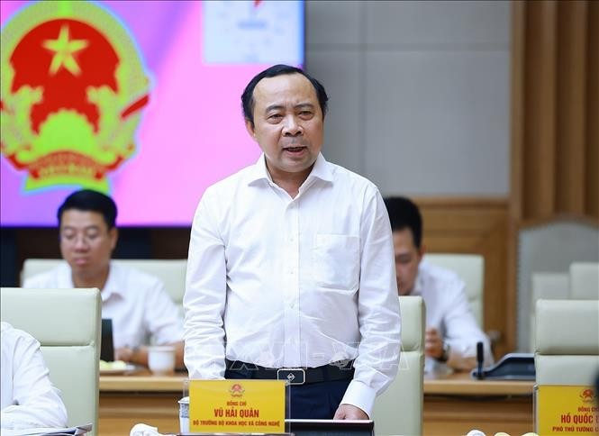 Bộ trưởng Bộ Khoa học và Công nghệ Vũ Hải Quân báo cáo tình hình phát triển khoa học, công nghệ, sáng 22/4. Ảnh: Dương Giang/TTXVN