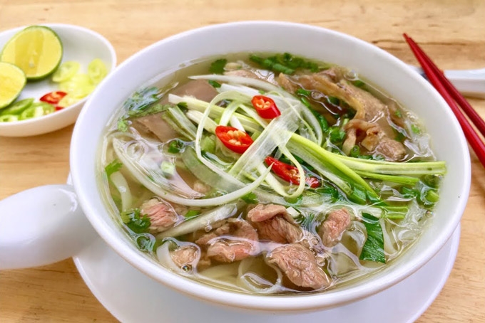 bao nuoc ngoai noi ve su khac nhau giua pho bac va pho nam cua viet nam