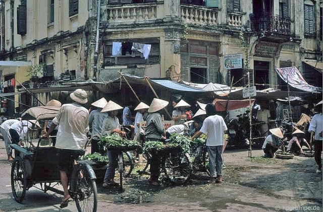 nhip song ha noi nhung nam 90 qua ong kinh cua nhiep anh gia nguoi duc