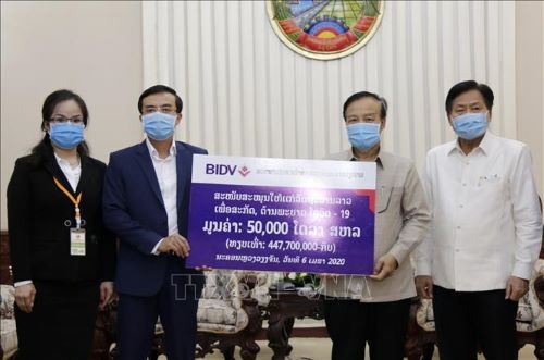 doanh nghiep viet tai tro 370000 usd giup lao chong covid 19