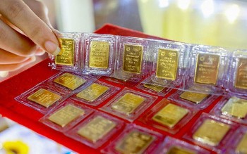 Giá vàng trong nước tăng nhẹ, vàng thế giới giảm mạnh