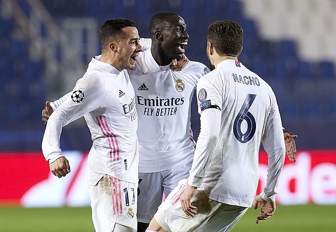 Kết quả bóng đá vòng 1/8 Cúp C1 hôm nay (25/2): Real thoát hiểm, Man City gây ấn tượng