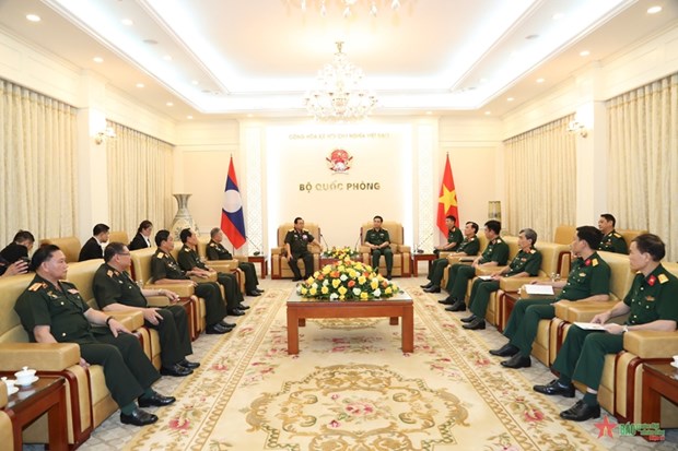 That chat tinh doan ket, huu nghi giua hai nuoc, hai quan doi Viet-Lao hinh anh 1