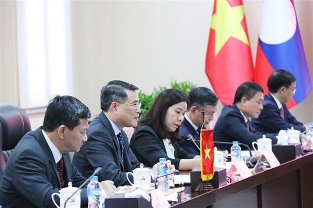 Van phong TW Dang Cong san Viet Nam va Dang NDCM Lao day manh hop tac hinh anh 3