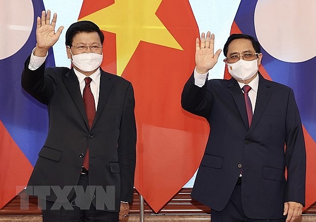 Tạo động lực thúc đẩy hợp tác toàn diện Việt Nam-Lào trong năm 2022 | Chính trị | Vietnam+ (VietnamPlus)