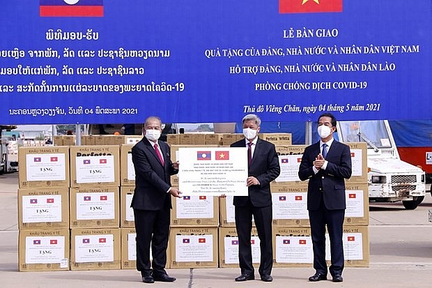 Hai nước Việt Nam-Lào sát cánh bên nhau, cùng phát triển | Chính trị | Vietnam+ (VietnamPlus)