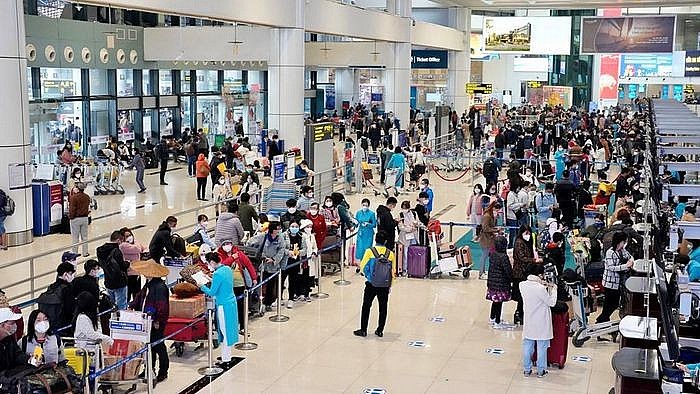 Hành khách tại sân bay Nội Bài những ngày sau Tết. Ảnh: NIA