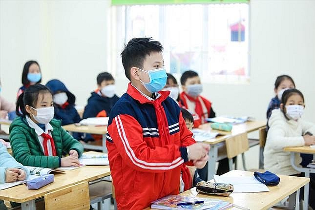 Học sinh đi học. (Ảnh: Tiền Phong). 