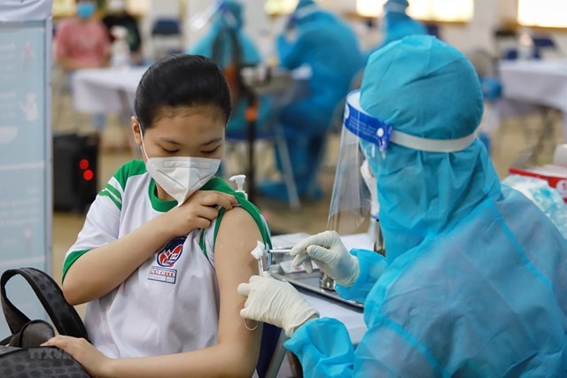 Bộ Y tế quyết định tiêm vaccine cho trẻ 5-11 tuổi mắc COVID-19 sau khi hồi phục ít nhất 3 tháng. (Ảnh minh họa)
