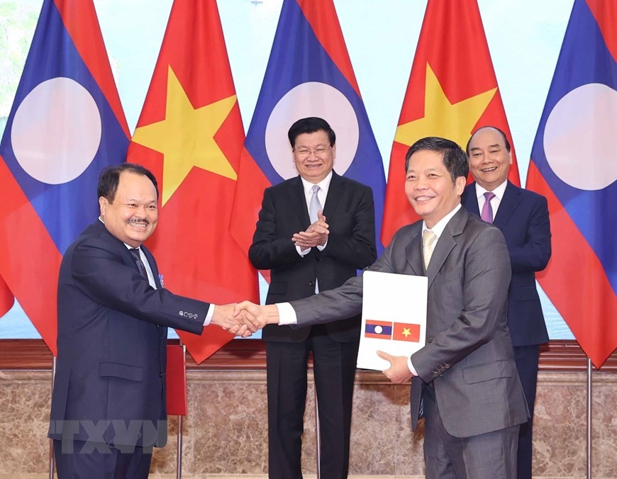 [Photo] Quan hệ hữu nghị vĩ đại, đoàn kết đặc biệt Việt Nam-Lào | Chính trị | Vietnam+ (VietnamPlus)