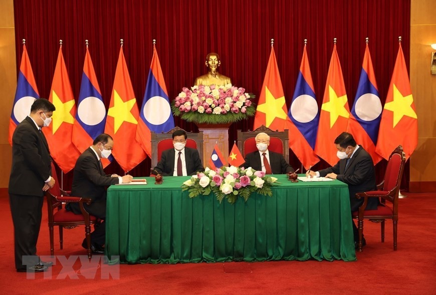 [Photo] Quan hệ hữu nghị vĩ đại, đoàn kết đặc biệt Việt Nam-Lào | Chính trị | Vietnam+ (VietnamPlus)