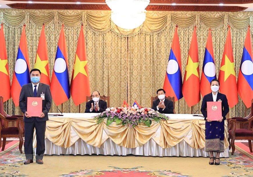 [Photo] Quan hệ hữu nghị vĩ đại, đoàn kết đặc biệt Việt Nam-Lào | Chính trị | Vietnam+ (VietnamPlus)
