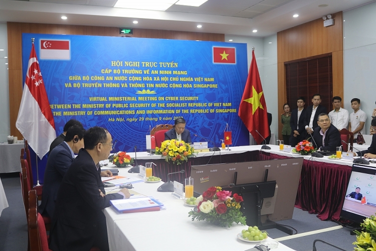 hoi dam truc tuyen giua bo truong bo cong an to lam va bo truong thong tin va truyen thong singapore