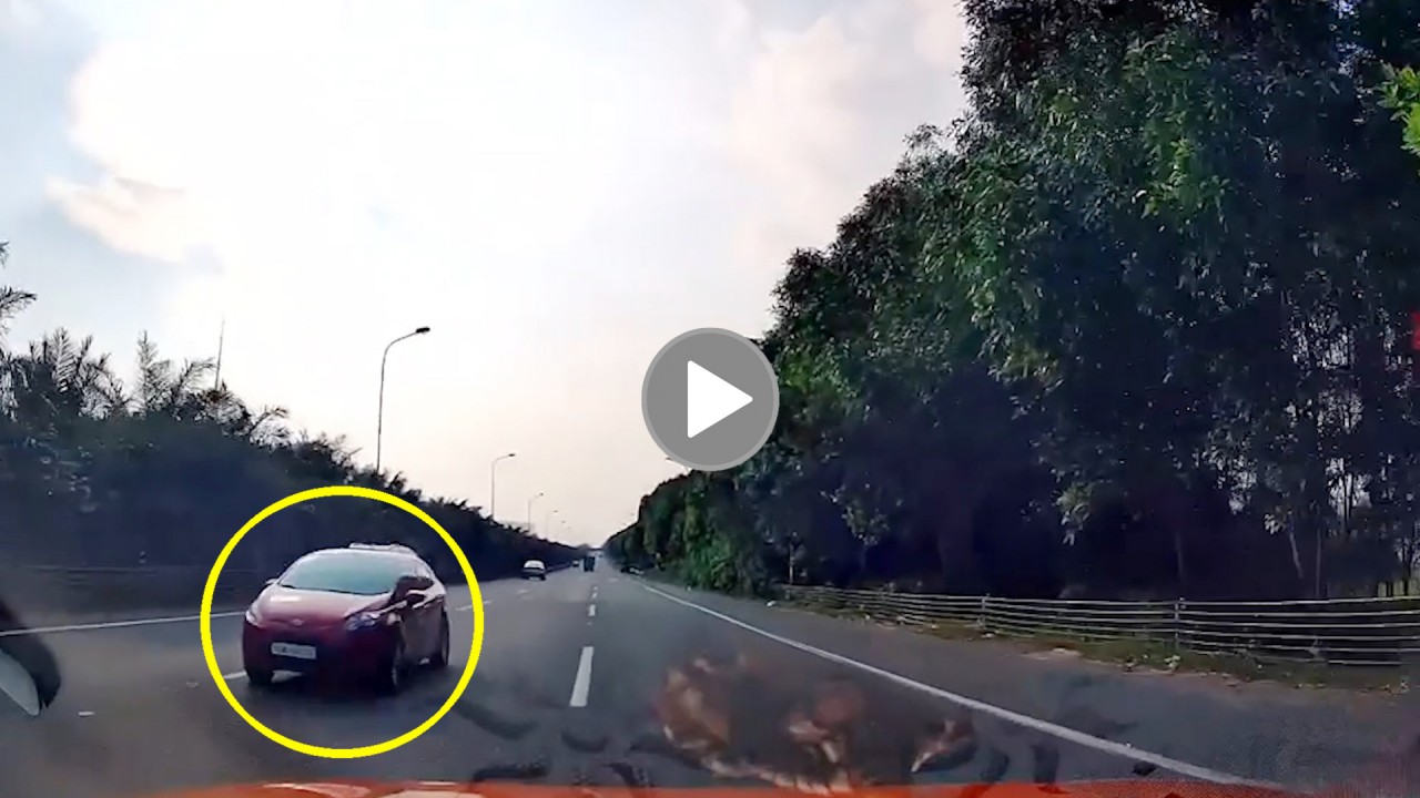 Thót tim cảnh ô tô phóng ngược chiều trên đại lộ Thăng Long