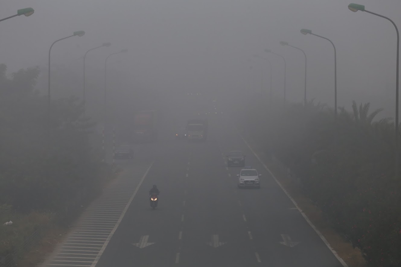 ha noi mu mit chim trong bau khong khi chat luong kem