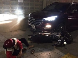 Nam thanh niên lái ô tô cố tình tông thẳng vào đôi vợ chồng đi xe máy ở Sài Gòn