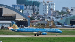 hanh khach dau bung may bay vietnam airlines ha canh khan cap xuong an do