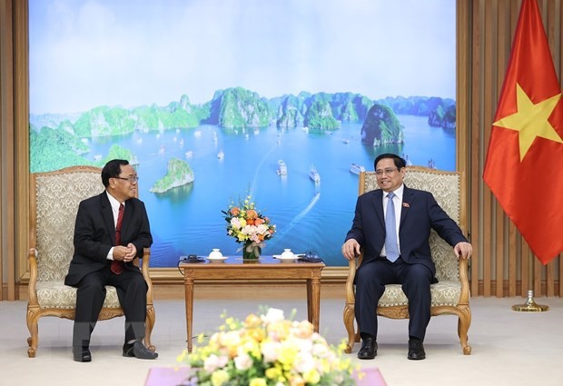 Thủ tướng Phạm Minh Chính tiếp đồng chí Khamphan Phommathat, Ủy viên Bộ Chính trị, Bí thư Trung ương Đảng, Chủ nhiệm Ban Kiểm tra Trung ương Đảng NDCM Lào, Trưởng Ban chống tham nhũng Trung ương, Tổng Thanh tra Nhà nước Lào. Ảnh: Dương Giang/TTXVN.