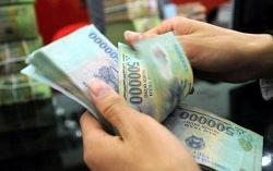 Lý do Việt Nam không phá giá tiền đồng