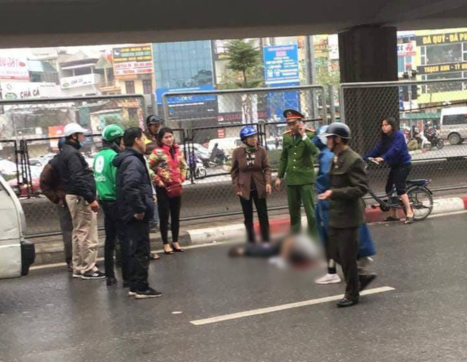 ha noi nguoi dan ong bat ngo nhay cau vuot nga tu so xuong dat nam bat dong tren vung mau