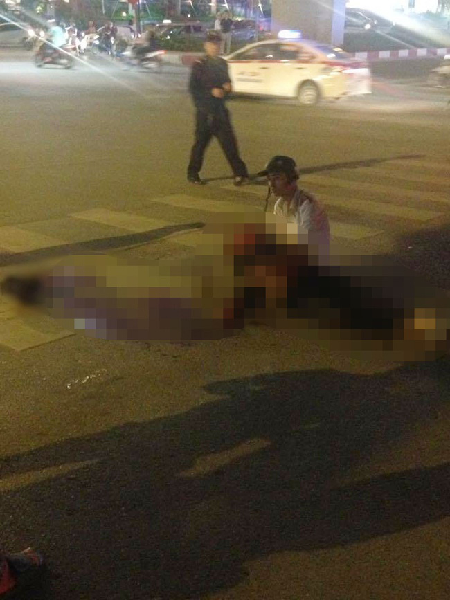 ha noi nam thanh nien chet lang om thi the ban gai bi xe tai can chet thuong tam