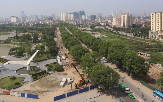 ha noi 1300 cay xanh tren duong pham van dong se bi chat ha trong 3 thang toi