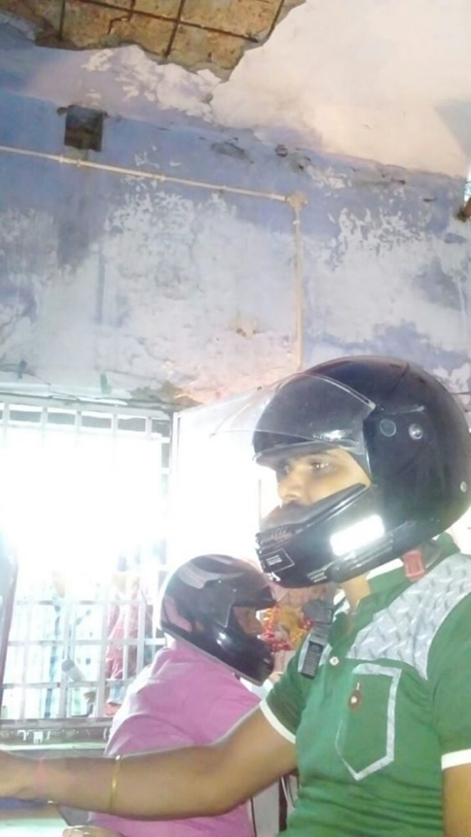 so tran nha sap vao dau nhan vien van phong an do dong loat doi mu bao hiem de bao toan tinh mang