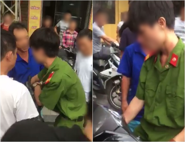 cong an xac minh thanh nien mac quan phuc khong deo bien ten bi nguoi dan vay danh khi bat xe vi pham