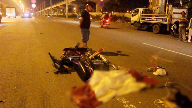 tphcm va cham voi xe container nam thanh nien tu vong tai cho co gai di cung nhap vien nguy kich