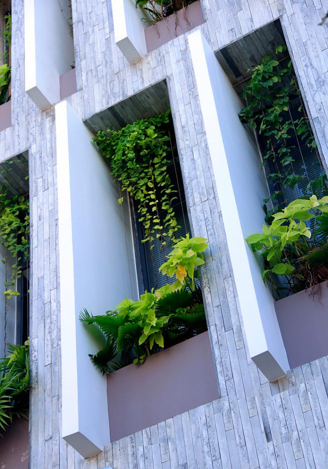 ngoi nha viet khien moi nguoi ngo ngang vi co ca mot cong vien tren san thuong va o giua nha