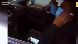 video tai xe trung quoc deo 12 chiec khau trang cung luc de phong dich corona