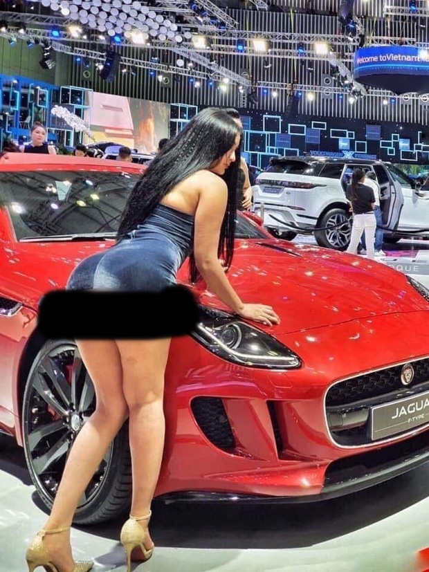 Cô gái "hở bạo" phản cảm bên ô tô Vinfast là ai? co gai an mac ho hang tao dang phan cam ben o to vinfast la ai